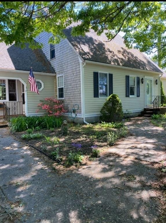51 Nye Ln, Bourne, MA 02532 - view of front facade with roof with shingles and a porch