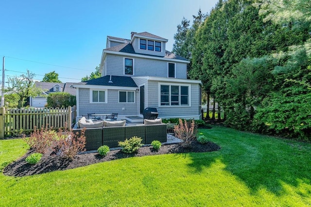 back of house featuring outdoor lounge area