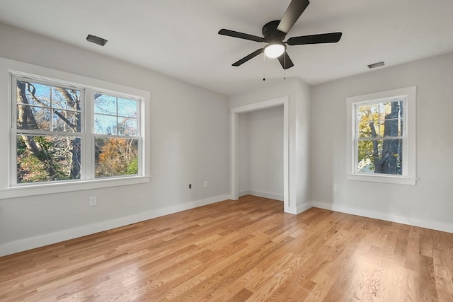 unfurnished bedroom featuring ceiling fan and light wood-type flooring