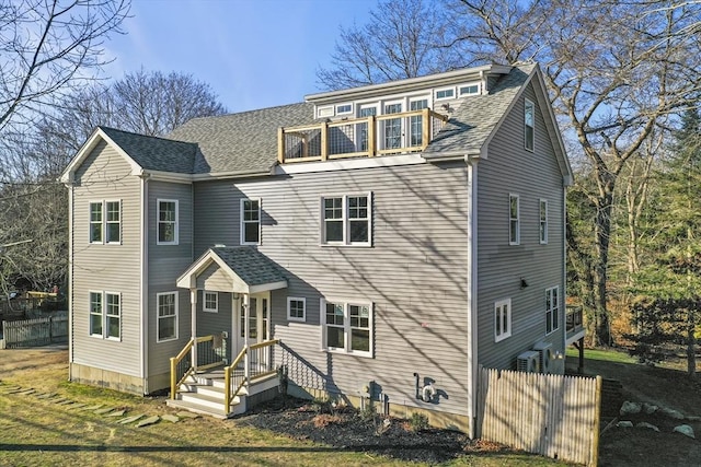 view of front of house with a balcony