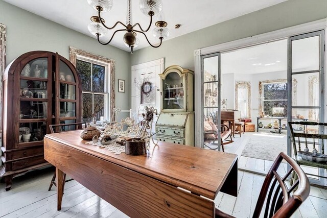 2241 Main St, Brewster, MA 02631 - dining area featuring a chandelier and hardwood / wood-style flooring