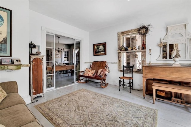 2241 Main St, Brewster, MA 02631 - sitting room featuring a chandelier and wood finished floors