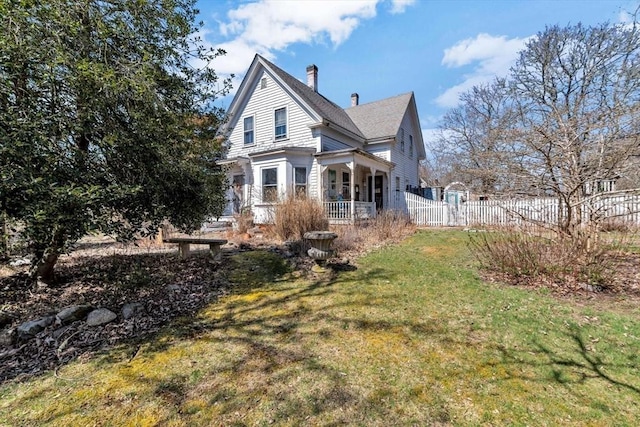 2241 Main St, Brewster, MA 02631 - rear view of property featuring a chimney