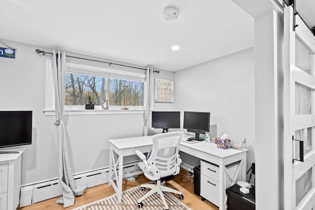 office space featuring light wood-type flooring