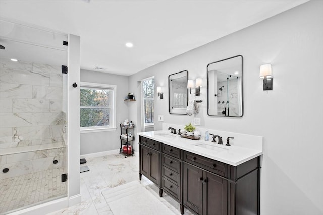 bathroom featuring vanity and a shower with door