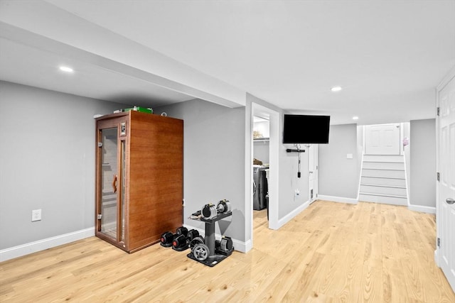 interior space featuring washer / dryer and light wood-type flooring