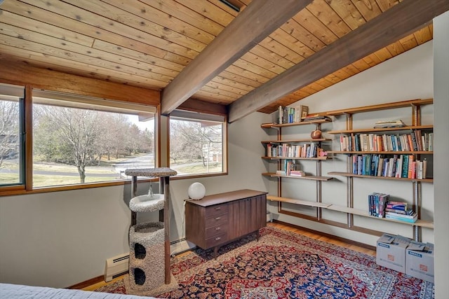 office area with wood ceiling, baseboards, light wood-style flooring, and a baseboard radiator