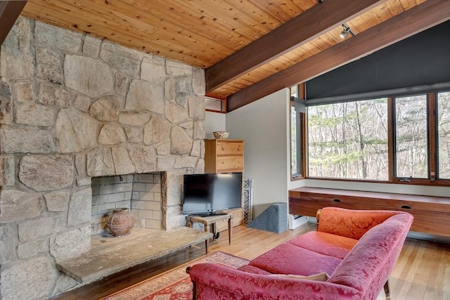 living room featuring wood ceiling, wood finished floors, and vaulted ceiling with beams