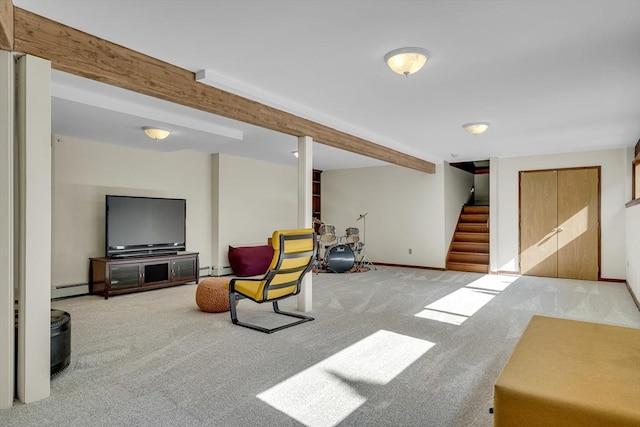 sitting room with baseboards, a baseboard heating unit, stairs, and carpet flooring