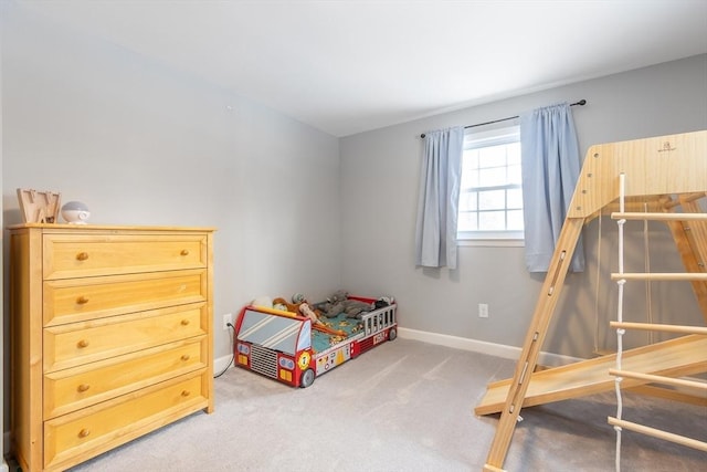 bedroom featuring light carpet