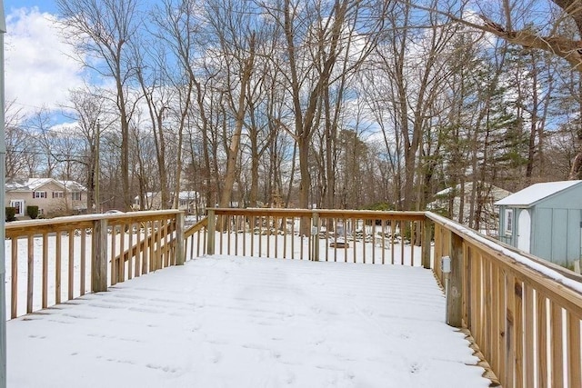 view of snow covered deck