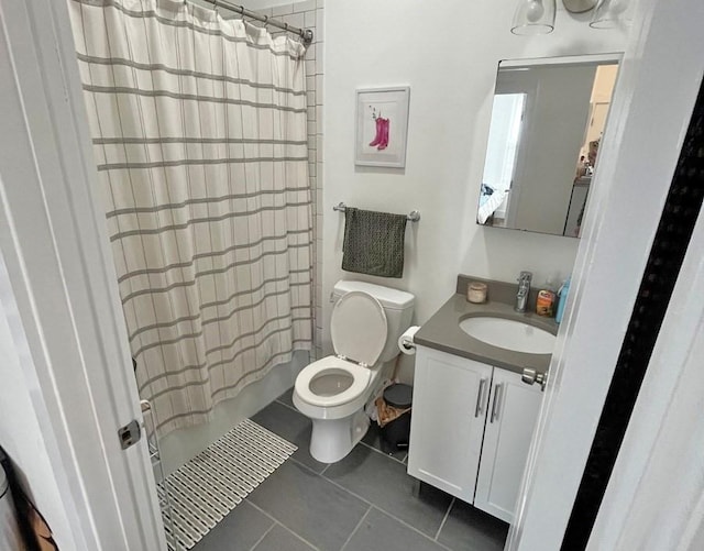 bathroom featuring tile patterned flooring, toilet, vanity, and shower / bathtub combination with curtain