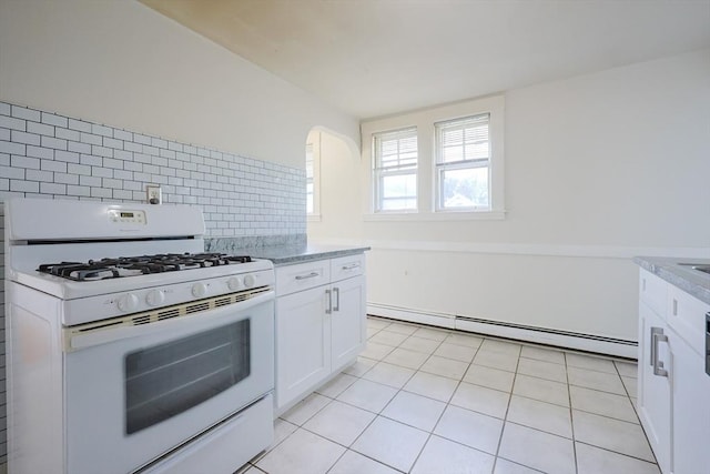 18-20 Melbourne Ave, Newton, MA 02460 - kitchen featuring white gas stove, a baseboard radiator, white cabinets, and tasteful backsplash