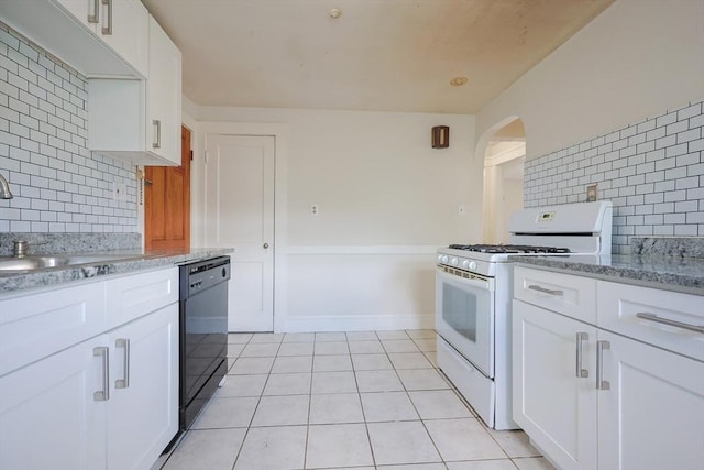 18-20 Melbourne Ave, Newton, MA 02460 - kitchen with white gas range oven, dishwasher, tasteful backsplash, light tile patterned floors, and white cabinets