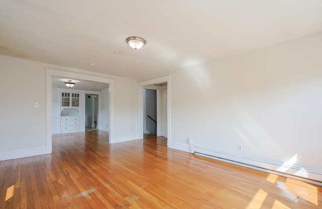 18-20 Melbourne Ave, Newton, MA 02460 - unfurnished room with a baseboard radiator and light wood-type flooring