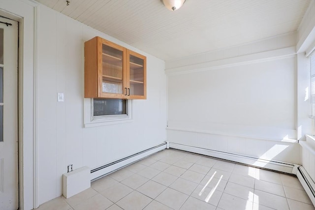 18-20 Melbourne Ave, Newton, MA 02460 - unfurnished room featuring a baseboard heating unit and light tile patterned flooring