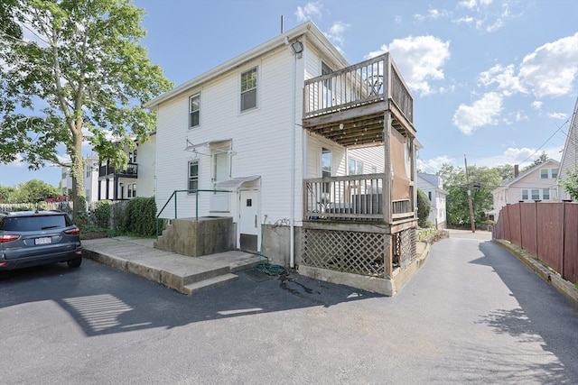18-20 Melbourne Ave, Newton, MA 02460 - back of property featuring a balcony