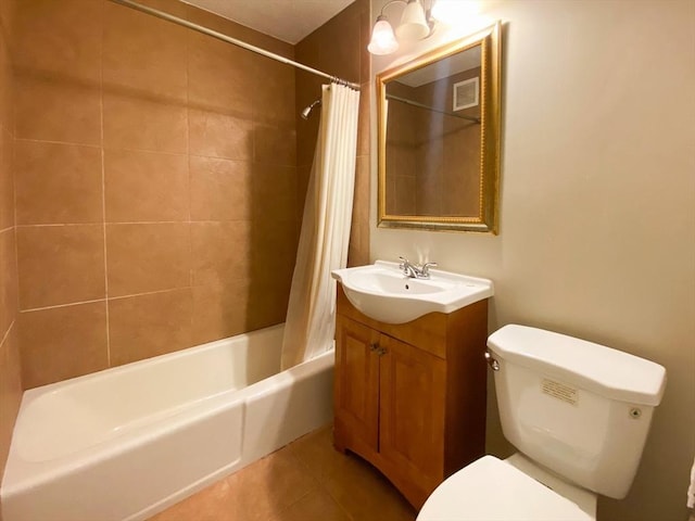 bathroom with tile patterned floors, visible vents, toilet, shower / bath combo, and vanity