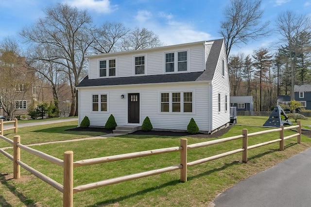 61 Greenwood Ave, Stoughton, MA 02072 - colonial inspired home with a shingled roof and entry steps