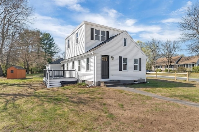 61 Greenwood Ave, Stoughton, MA 02072 - traditional home with a front lawn and a deck