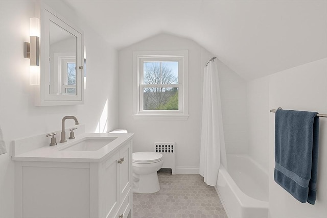 61 Greenwood Ave, Stoughton, MA 02072 - full bath featuring radiator heating unit, vaulted ceiling, toilet, vanity, and shower / bath combo