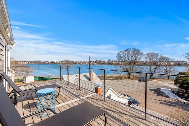 deck featuring a water view