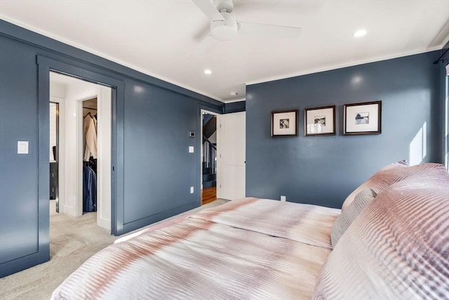 bedroom featuring recessed lighting, a closet, a spacious closet, a ceiling fan, and carpet flooring