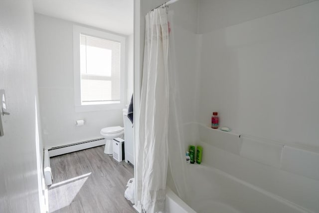 full bathroom featuring shower / bath combination with curtain, toilet, wood finished floors, and baseboard heating