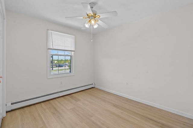 447 Old Connecticut Path, Framingham, MA 01701 - empty room featuring a baseboard radiator, wood finished floors, ceiling fan, and baseboards