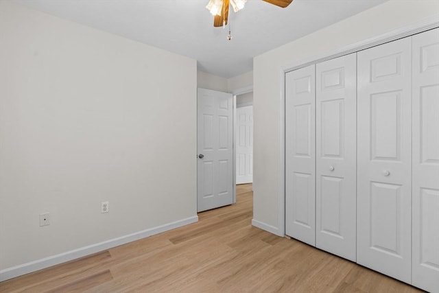 447 Old Connecticut Path, Framingham, MA 01701 - unfurnished bedroom with baseboards, light wood finished floors, a closet, and a ceiling fan