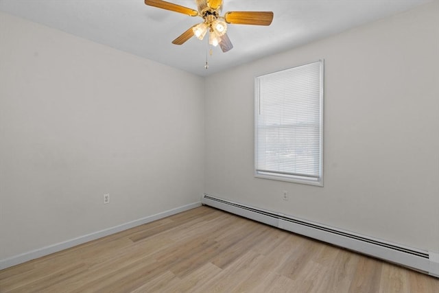 447 Old Connecticut Path, Framingham, MA 01701 - spare room with a baseboard radiator, wood finished floors, ceiling fan, and baseboards