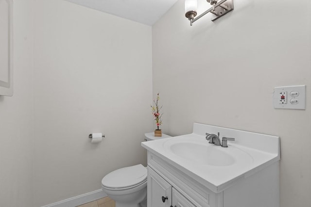 447 Old Connecticut Path, Framingham, MA 01701 - bathroom featuring vanity, toilet, tile patterned floors, and baseboards