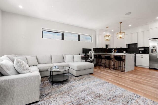 388 Athens St Unit 1, Boston, MA 02127 - living area with light wood-style floors and recessed lighting