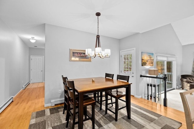7 Hemlock, Kingston, MA 02364 - dining room with a notable chandelier, baseboard heating, light wood-type flooring, baseboards, and a baseboard radiator
