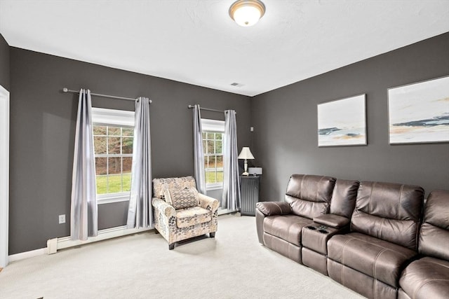 7 Hemlock, Kingston, MA 02364 - living area featuring light colored carpet and baseboards