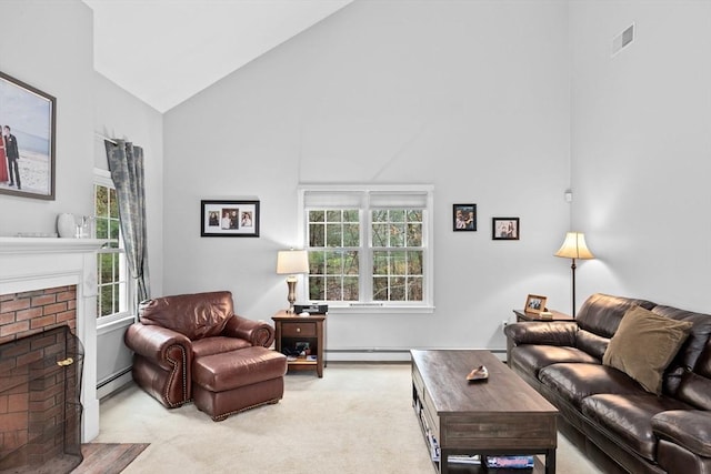 7 Hemlock, Kingston, MA 02364 - carpeted living area with high vaulted ceiling, a brick fireplace, a baseboard heating unit, and visible vents