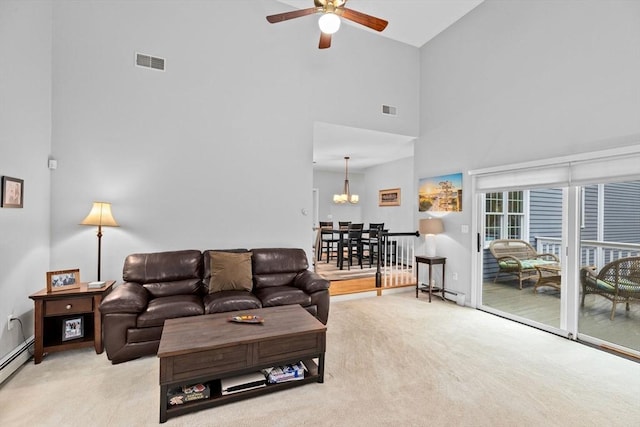 7 Hemlock, Kingston, MA 02364 - living area featuring ceiling fan with notable chandelier, high vaulted ceiling, carpet, and visible vents