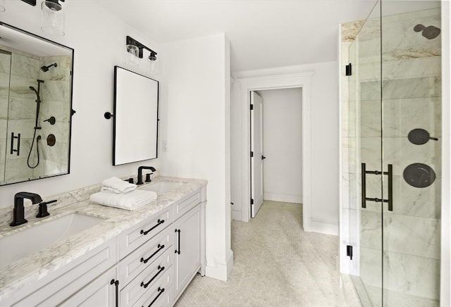 bathroom featuring double vanity, a sink, and a shower stall
