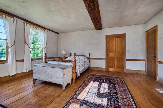 bedroom featuring wood-type flooring