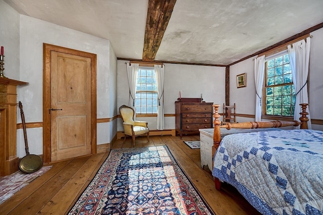 bedroom with hardwood / wood-style floors