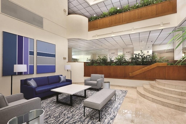 210 Nahanton St Unit 504, Newton, MA 02459 - community lobby featuring a towering ceiling and recessed lighting
