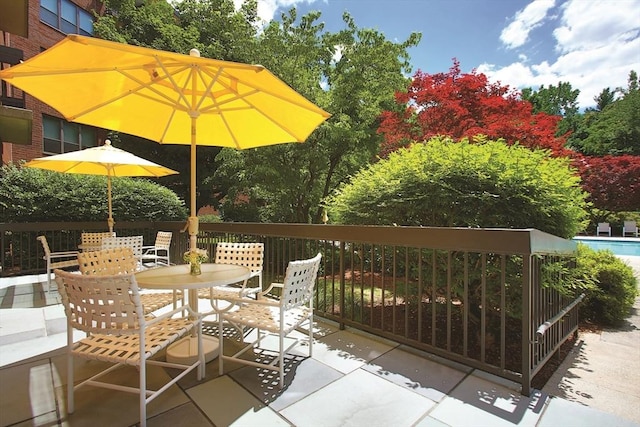 210 Nahanton St Unit 504, Newton, MA 02459 - view of patio / terrace with outdoor dining space