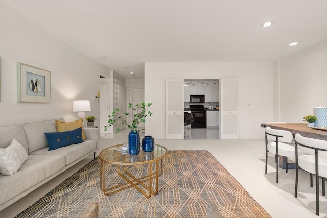 210 Nahanton St Unit 504, Newton, MA 02459 - living room featuring recessed lighting and light colored carpet
