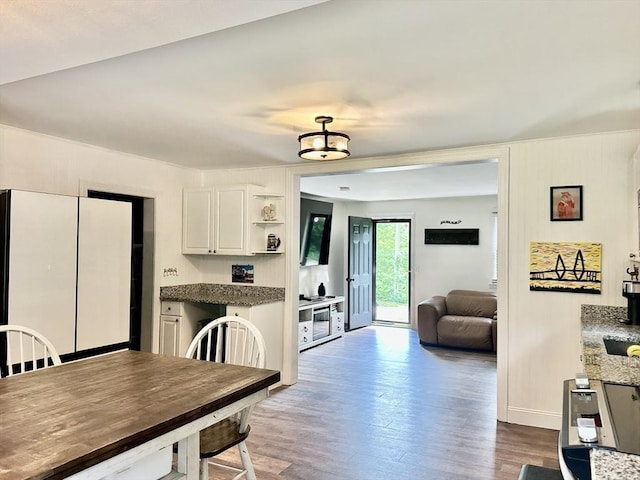 20 Benson St, Middleboro, MA 02346 - kitchen featuring wood finished floors, white cabinetry, open shelves, and dark countertops