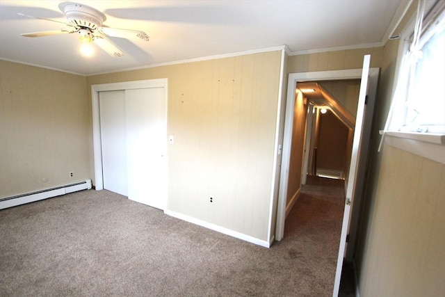 75 Wachusett St, Franklin, MA 02038 - unfurnished bedroom featuring carpet flooring, ornamental molding, a closet, ceiling fan, and a baseboard heating unit
