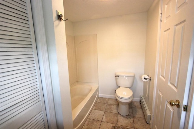 75 Wachusett St, Franklin, MA 02038 - full bath featuring a baseboard heating unit, toilet, baseboards, a tub to relax in, and tile patterned flooring