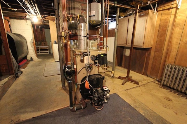 75 Wachusett St, Franklin, MA 02038 - unfinished basement featuring oil tank, radiator heating unit, and a heating unit