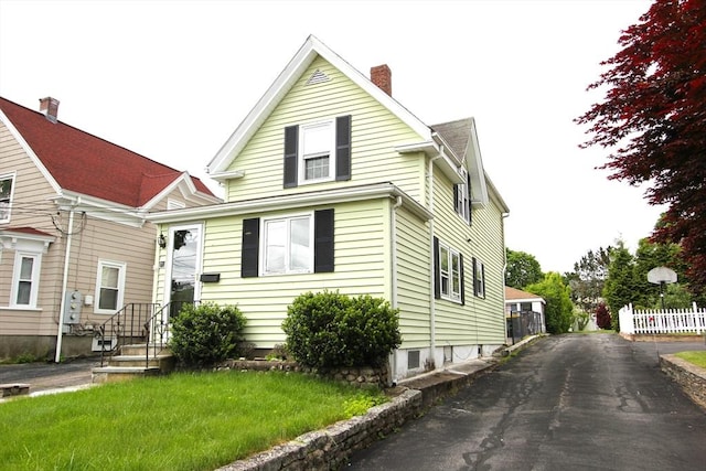 75 Wachusett St, Franklin, MA 02038 - view of front of house with a chimney