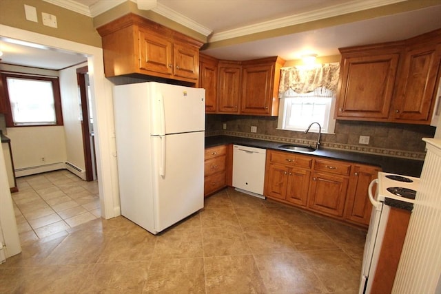 75 Wachusett St, Franklin, MA 02038 - kitchen featuring white appliances, a sink, brown cabinets, dark countertops, and crown molding