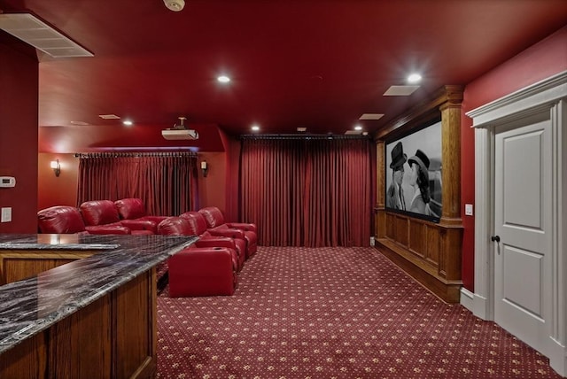 cinema with recessed lighting, visible vents, and carpet flooring